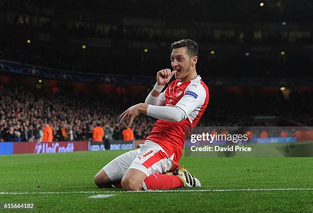 Mesut Ozil celebrates scoring his 2nd goal, Arsenal's 5th, during the UEFA Champions League match between Arsenal FC and PFC Ludogorets Razgrad at...