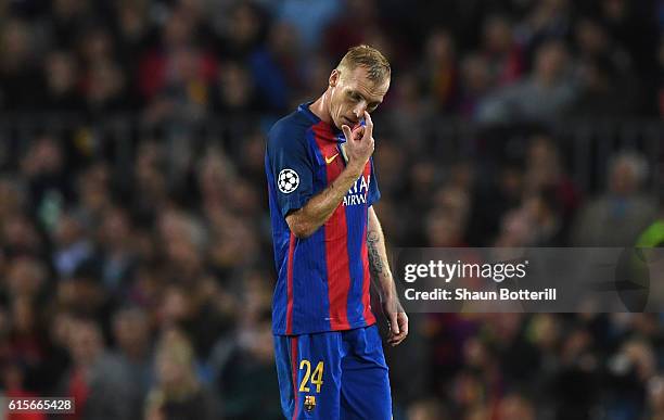 Jeremy Mathieu of Barcelona walks off after being sent off during the UEFA Champions League group C match between FC Barcelona and Manchester City FC...