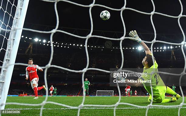 Mesut Ozil of Arsenal scores his second goal of the game during the UEFA Champions League group A match between Arsenal FC and PFC Ludogorets Razgrad...