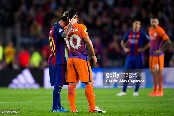 Lionel Messi of FC Barcelona comforts Sergio Aguero of Manchester City FC during the UEFA Champions League group C match between FC Barcelona and...