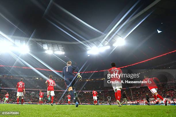 Manuel Neuer, keeper of Muenchen enters the field of play with his team mates for the UEFA Champions League group D match between FC Bayern Muenchen...