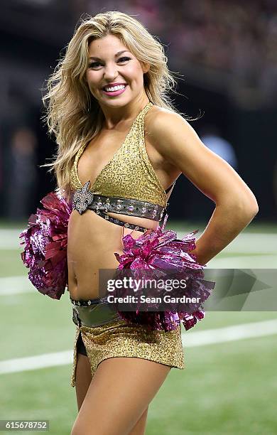 New Orleans Saints cheerleader performs during a game against the Carolina Panthers at the Mercedes-Benz Superdome on October 16, 2016 in New...