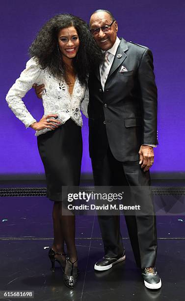 Four Tops member Duke Fakir poses with cast members of the West End production of "Motown The Musical" at The Shaftesbury Theatre on October 19, 2016...