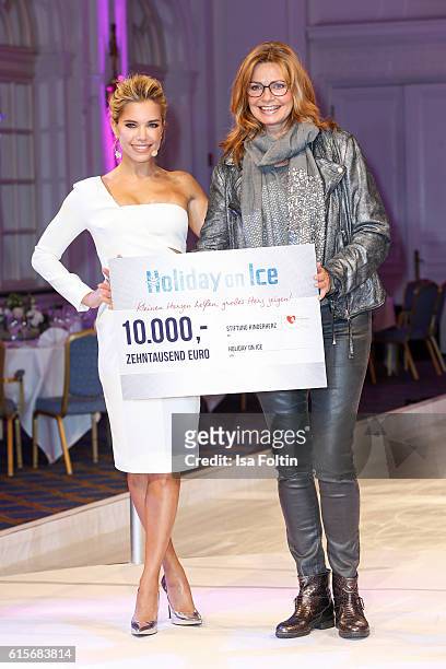 Dutch moderator Sylvie Meis and german actress Maren Gilzer attend the 'Holiday on Ice' gala at Hotel Atlantic on October 19, 2016 in Hamburg,...