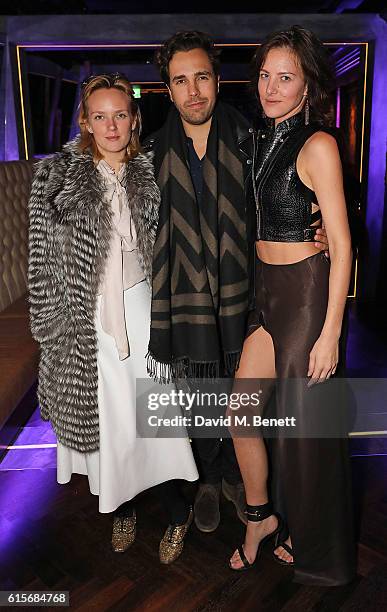 Charlotte Carroll, Diego Bivero-Volpe and guest attend the launch of MNKY HSE late-night restaurant, Mayfair on October 19, 2016 in London, England.