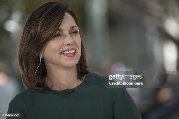 Beth Comstock, vice chair of General Electric Co. , smiles during a Bloomberg Technology television interview at the Vanity Fair New Establishment...