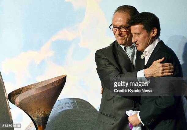 Brazil - Carlos Arthur Nuzman , president of Rio 2016 Olympic Games organizing committee, receives a torch used at the 2012 London Games from...