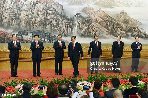 China - Chinese Vice President Xi Jinping heads for the rostrum after being elected Chinese President at the Great Hall of the People in Beijing on...