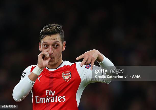 Mesut Ozil of Arsenal celebrates after scoring during the UEFA Champions League match between Arsenal FC and PFC Ludogorets Razgrad at Emirates...