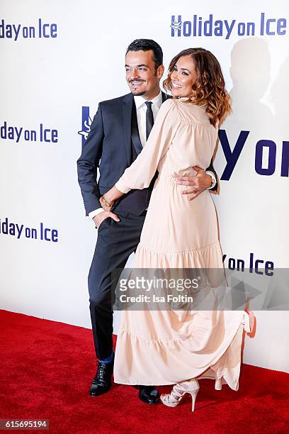 German singer Giovanni Zarrella and his wife brazilian model Jana Ina Zarrella attend the 'Holiday on Ice' gala at Hotel Atlantic on October 19, 2016...