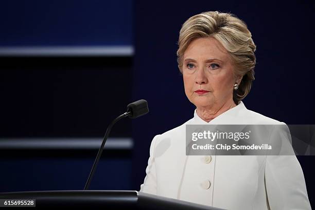 Democratic presidential nominee former Secretary of State Hillary Clinton pauses during the third U.S. Presidential debate at the Thomas & Mack...