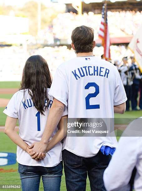 Mila Kunis and Ashton Kutcher attend game 4 of the NLCS between the Chicago Cubs and the Los Angeles Dodgers at Dodger Stadium on October 19, 2016 in...