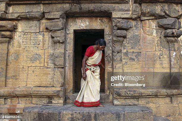 Devotee looks round the the Brihadeshwara Temple in Thanjavur, Tamil Nadu, India, on Sunday, Oct. 16, 2016. India's new central bank head seems to be...