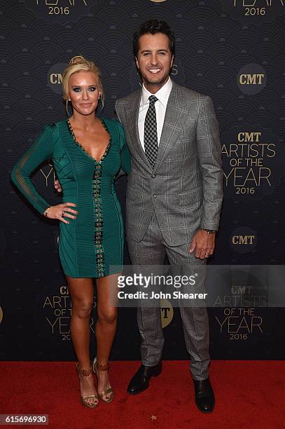 Caroline Boyer and singer-songwriter Luke Bryan arrive on the red carpet at CMT Artists of the Year 2016 on October 19, 2016 in Nashville, Tennessee.