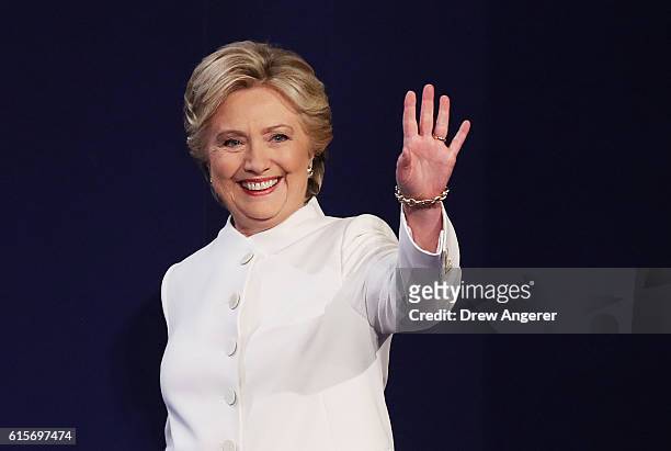 Democratic presidential nominee former Secretary of State Hillary Clinton waves to the crowd as she walks on the stage during the third U.S....