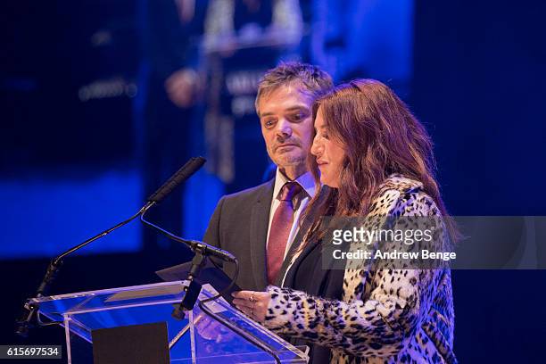 Louiza Patikas and Timothy Watson present the award for "Best Audio Dramatisation" at the Audio & Radio Industry Awards at First Direct Arena Leeds...