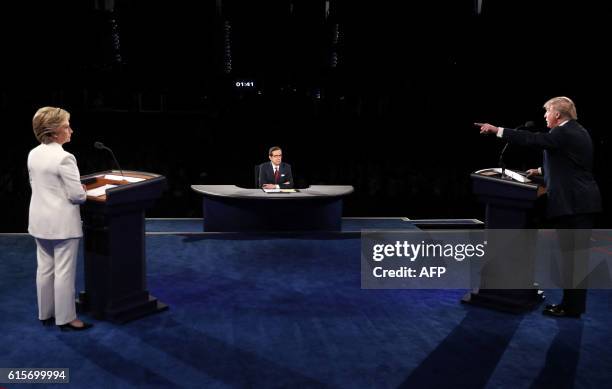 Democratic nominee Hillary Clinton and Republican nominee Donald Trump take part in the final presidential debate at the Thomas & Mack Center on the...