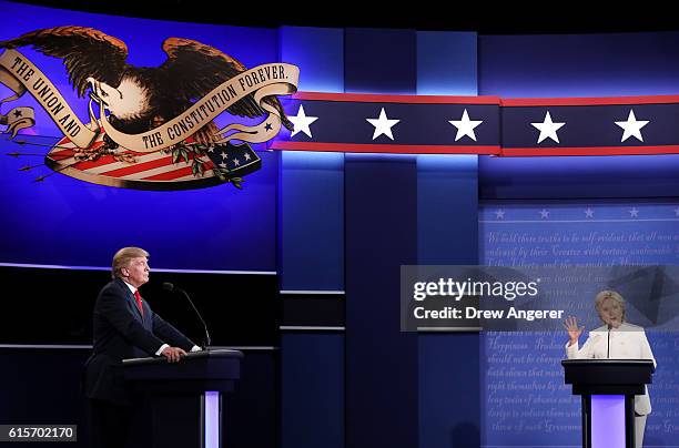 Democratic presidential nominee former Secretary of State Hillary Clinton debates with Republican presidential nominee Donald Trump during the third...