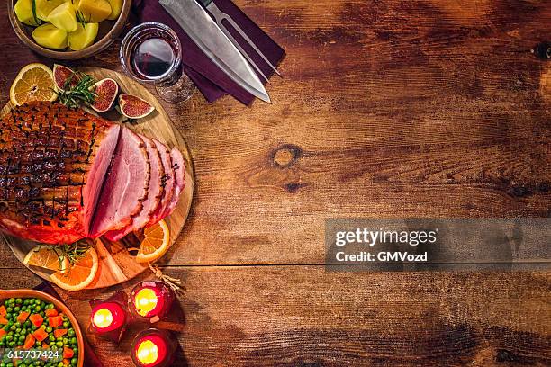 glazed holiday ham with cloves background - spit roasted stock pictures, royalty-free photos & images