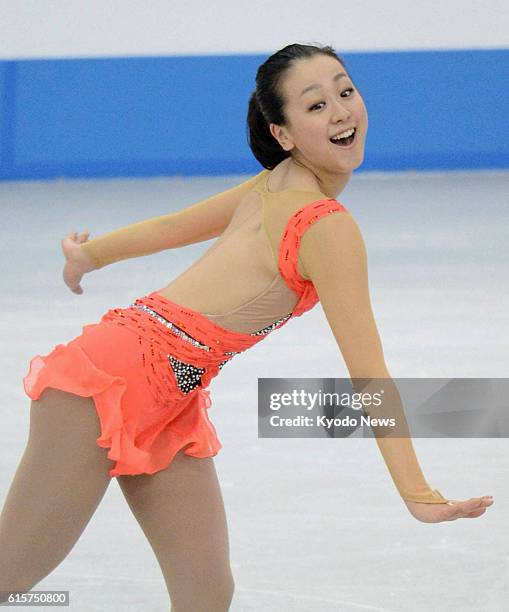 Japan - Japan's Mao Asada performs in the women's short program of the NHK Trophy at Sekisui Heim Super Arena in Miyagi Prefecture on Nov. 23, 2012....