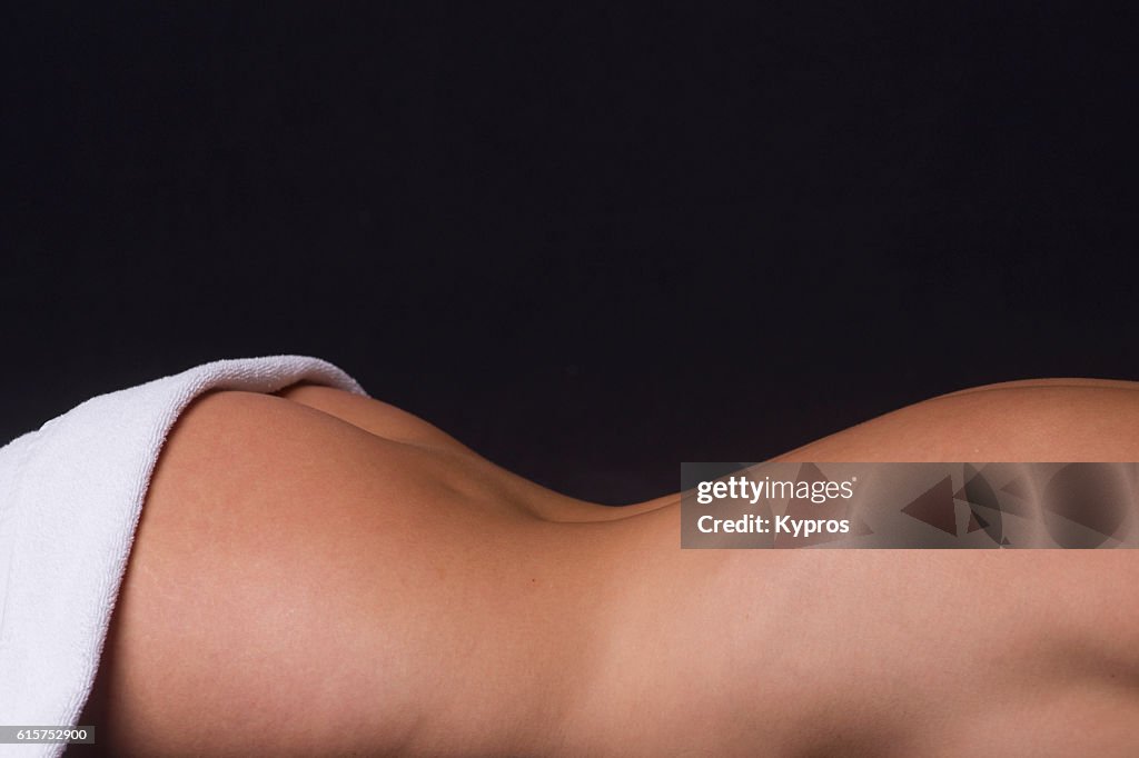 Studio Shot Of Young Woman With Bath Towel