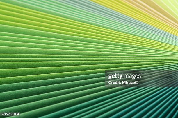 green paper pages stack radial gradient - wellbeing background stock pictures, royalty-free photos & images