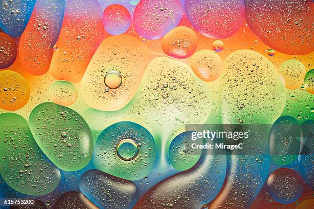 colorful oil abstract - tropfen aufprall stock-fotos und bilder