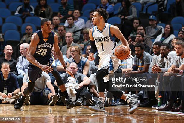 Tyus Jones of the Minnesota Timberwolves handles the ball against D.J. Stephens of the Memphis Grizzlies during a preseason game on October 19, 2016...