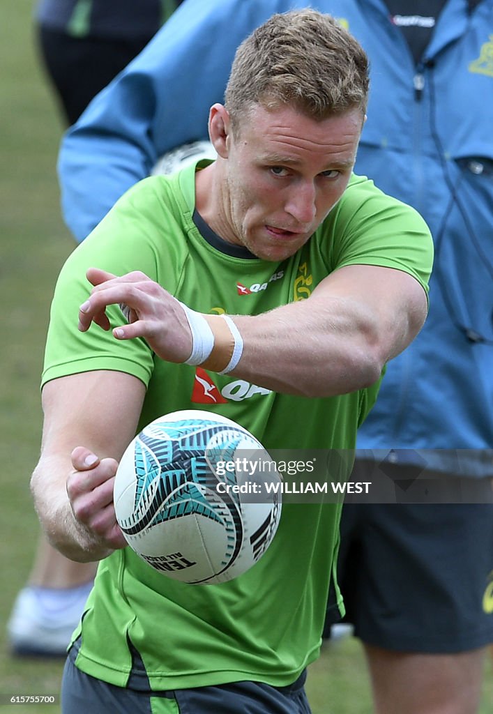 Australian Rugby Reece Australian Wallabies rugby player Reece Hodge spins out a pass during ...