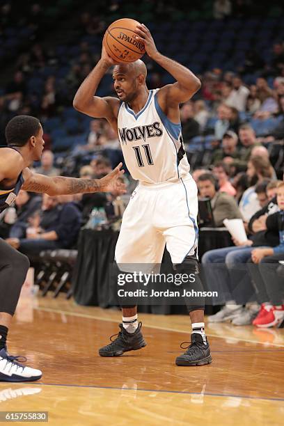 John Lucas III of the Minnesota Timberwolves handles the ball during a preseason game against the Memphis Grizzlies on October 19, 2016 at Target...