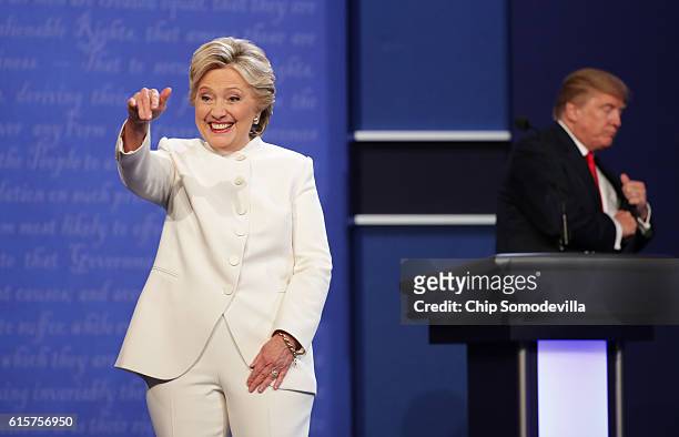 Democratic presidential nominee former Secretary of State Hillary Clinton gestures to the crowd as she walks off stage as Republican presidential...