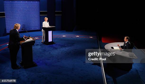 Fox News anchor and moderator Chris Wallace speaks to Republican presidential nominee Donald Trump and Democratic presidential nominee former...