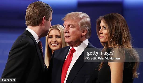 Eric Trump, Ivanka Trump, Republican presidential nominee Donald Trump and his wife Melania Trump acknowledge the crowd after the third U.S....
