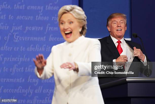 Democratic presidential nominee former Secretary of State Hillary Clinton gestures to the crowd as she walks off stage as Republican presidential...