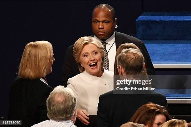 Democratic presidential nominee former Secretary of State Hillary Clinton speaks to guests including Hewlett Packard CEO Meg Whitman after the third...