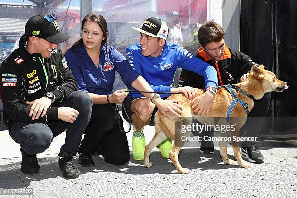 Pol Espargaro of Spain and Monster Yamaha Tech 3, Aleix Espargaro of Spain and Team Suzuki Ecstar and Albert Arenas of Spain and Peugeot MC Saxoprint...