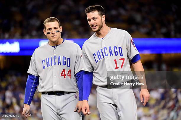 Anthony Rizzo and Kris Bryant of the Chicago Cubs look on in the eighth inning against the Los Angeles Dodgers in game four of the National League...