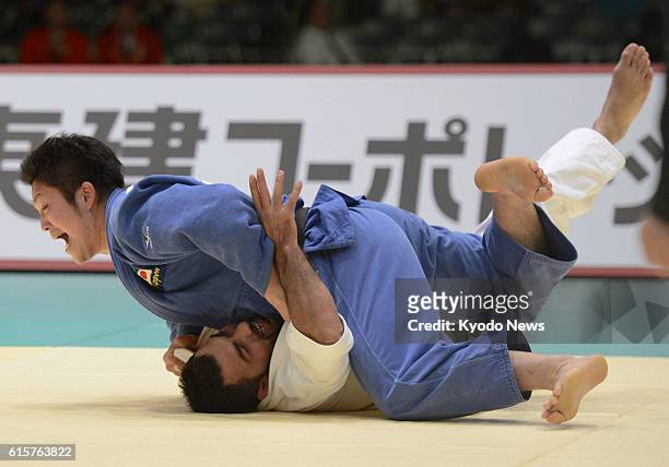 Japan - Japan's Daisuke Kobayashi defeats Ilias Iliadis of Greece to win the men's 100-kilogram title of the Tokyo Grand Slam judo tournament at...