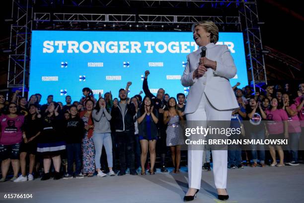 Democratic presidential nominee Hillary Clinton pauses while speaking to supporters at Craig Ranch Regional Park Amphitheater after the final...