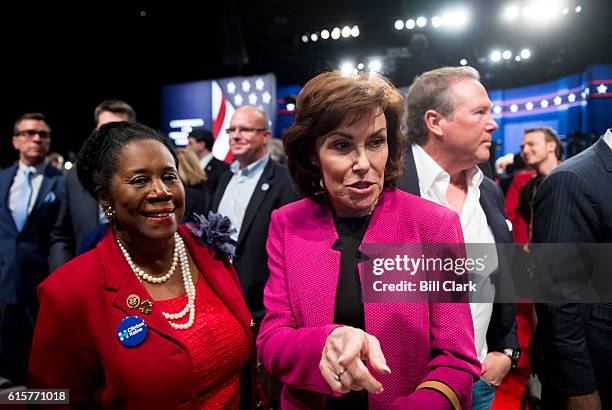 Rep. Sheila Jackson Lee, D-Texas, left, and Jacky Rosen, Democratic candidate for Nevadas 3rd Congressional district, look for their seats before the...