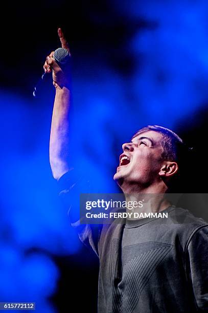 Dutch DJ Martin Garrix performs in the Heineken Music Hall after being revealed as the winner of the DJ Mag Top 100 DJs Poll 2016, during the...