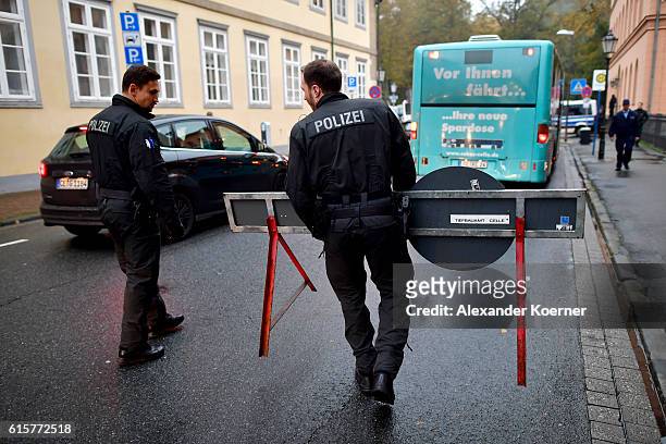 Policemen set up a barricade outside the Oberlandesgericht Celle courthouse ahead of the first day of the trial aginst Safia S. On October 20, 2016...