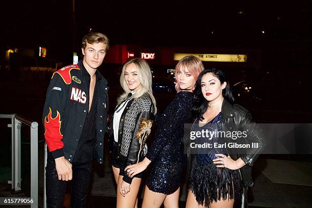 Members of the band The Atomics Lucky Blue Smith, Daisy Smith, Pyper America Smith and Starlie Smith pose for a photo before their performanc at The...