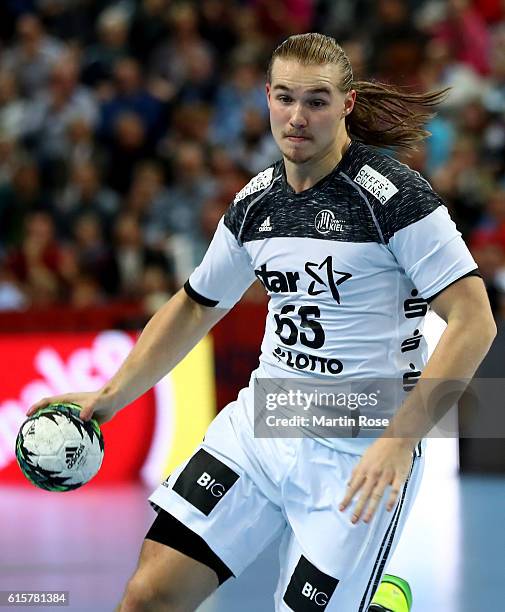 Lukas Nilsson of Kiel in action during the DKB HBL Bundesliga match between THW Kiel and TSV Hannover-Burgdorf at Sparkassen Arena on October 19,...