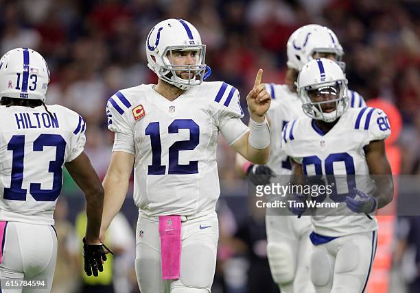 Andrew Luck of the Indianapolis Colts signals toward the sideline in the fourth quarter during the NFL game between the Indianapolis Colts and the...
