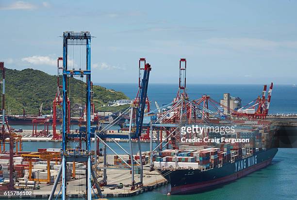 Container ship YM Unanimity seen docked at its home port in Keelung after a journey from Busan, Korea. Keelung Harbor in Taiwan is the northernmost...