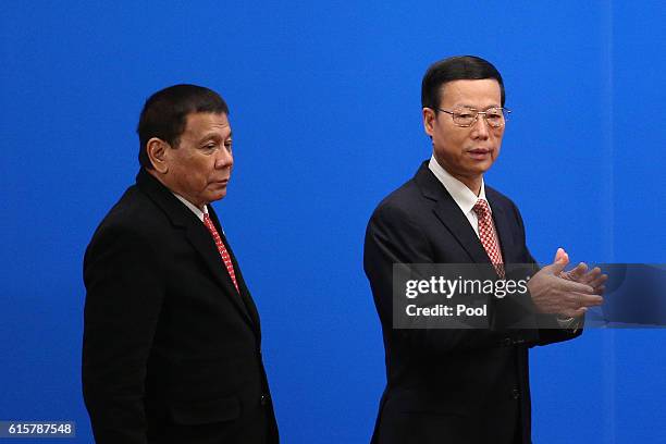 Chinese Vice-Premier Zhang Gaoli and Philippines President Rodrigo Duterte arrive for the Philippines - China Trade and Investment Fourm at the Great...
