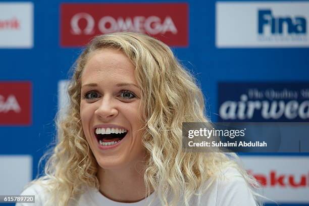 Hilary Caldwell of Canada reacts on stage during the International Swim Stars Meet and Greet at Kallang Wave Mall Atrium ahead of the FINA Swimming...