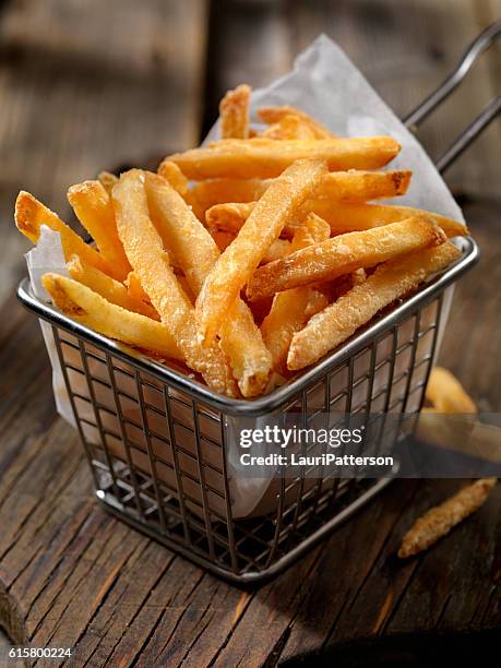 basket of french fries - side dish stock pictures, royalty-free photos & images