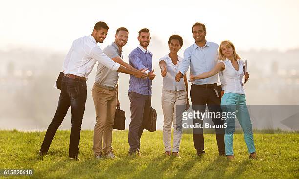 we are successful business team! - business casual outfit stock pictures, royalty-free photos & images
